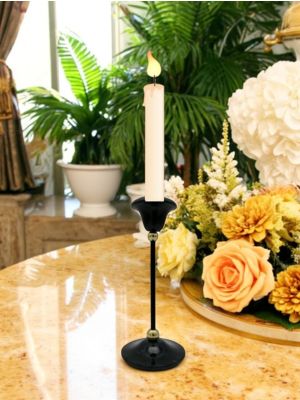 Black marble candle holder, handmade from genuine natural stone with unique decorative design.
