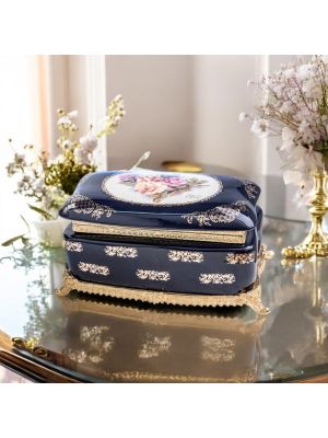 Box, elegant jewelry box in fine ceramic, with refined gold details.