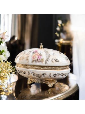 Box, elegant jewelry box in fine ceramic, with refined gold details.