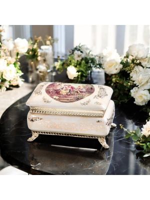 Box, elegant jewelry box in fine ceramic, with refined gold details.