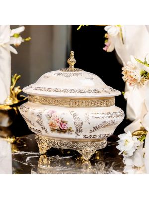 Box, elegant jewelry box in fine ceramic, with elegant golden details.