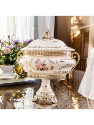 Box, elegant jewelry box in fine ceramic, with elegant floral and gold details.