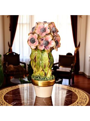 Artistic ceramic plant decorated with anemones and golden details, made entirely by hand.