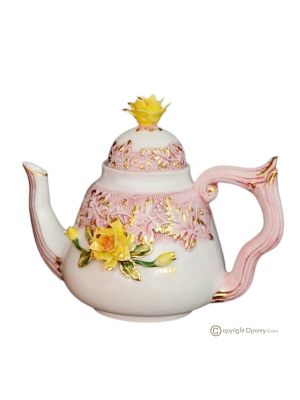 Handcrafted ceramic teapot in baroque style, enriched with elegant flowers and golden details.