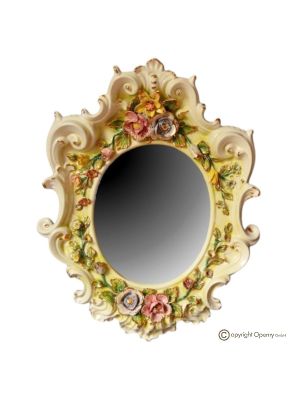 Mirror in fine ceramic, baroque style, decorated with flowers and gold details, handmade