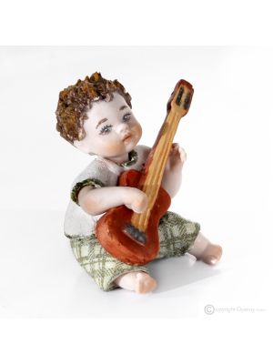 EDDIE - Unique pieces: musician with guitar, Italian porcelain doll.