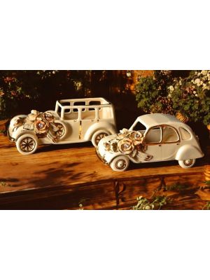 Ford and Cytroen, ceramic cars, with roses, crystals and gold details, hand made.