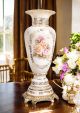 High quality ceramic vase, decorated with flowers and golden details, handmade.