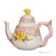 Handcrafted ceramic teapot in baroque style, enriched with elegant flowers and golden details.