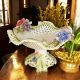 Stand, artistic ceramic centerpiece, decorated with flowers and gold details, handmade