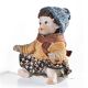 MIGNON-F - Elegance from another era for this porcelain doll.