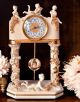 Grandfather clock with columns and cupids, high quality ceramic, handmade.