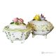 Set of 2 decorative boxes in refined ceramic, embellished with flowers and golden details.